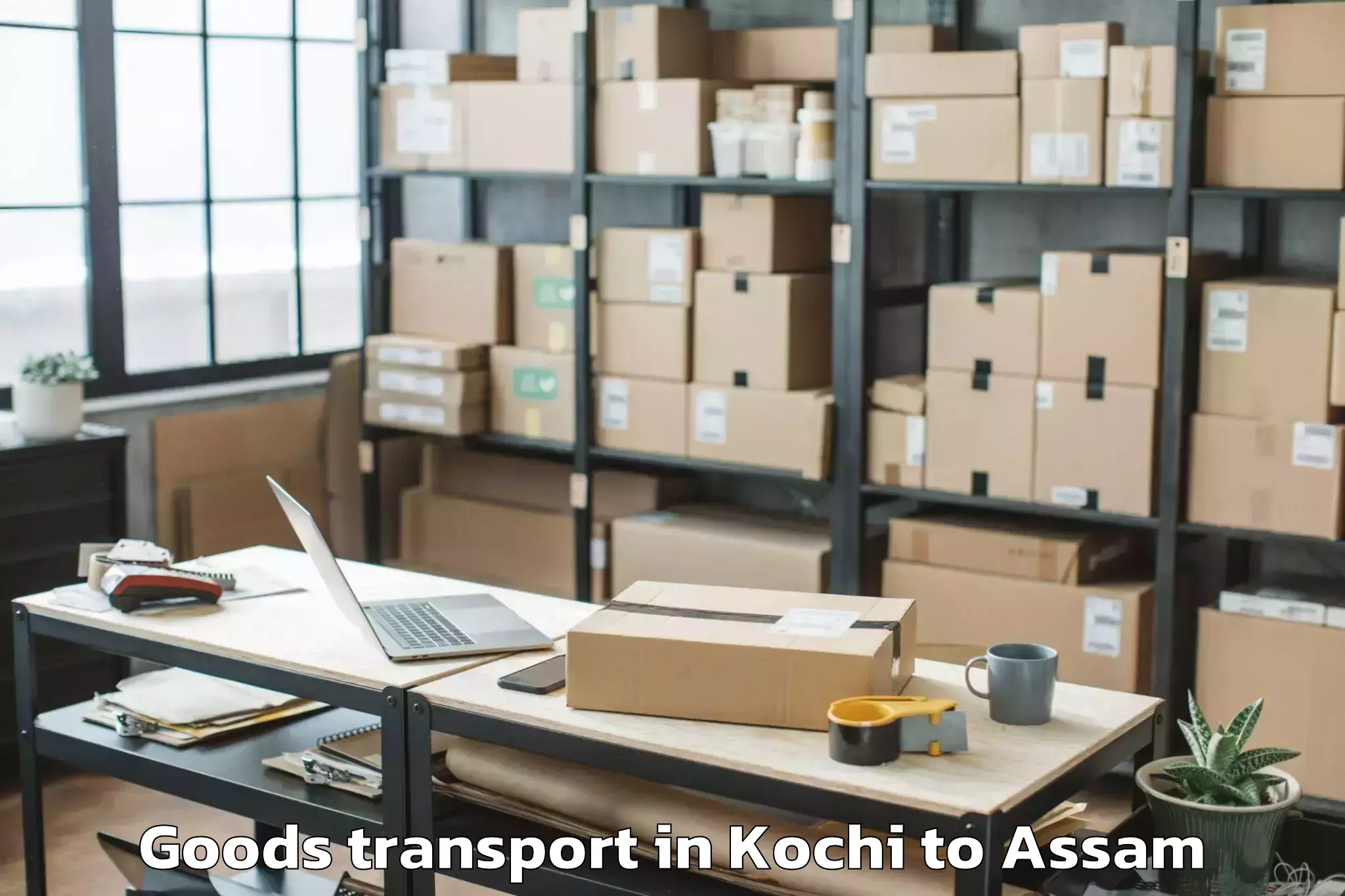 Top Kochi to Bokajan Goods Transport Available